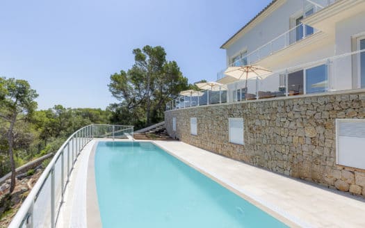 Modern villa in first sea line with private sea access directly on green zone of Torrenova